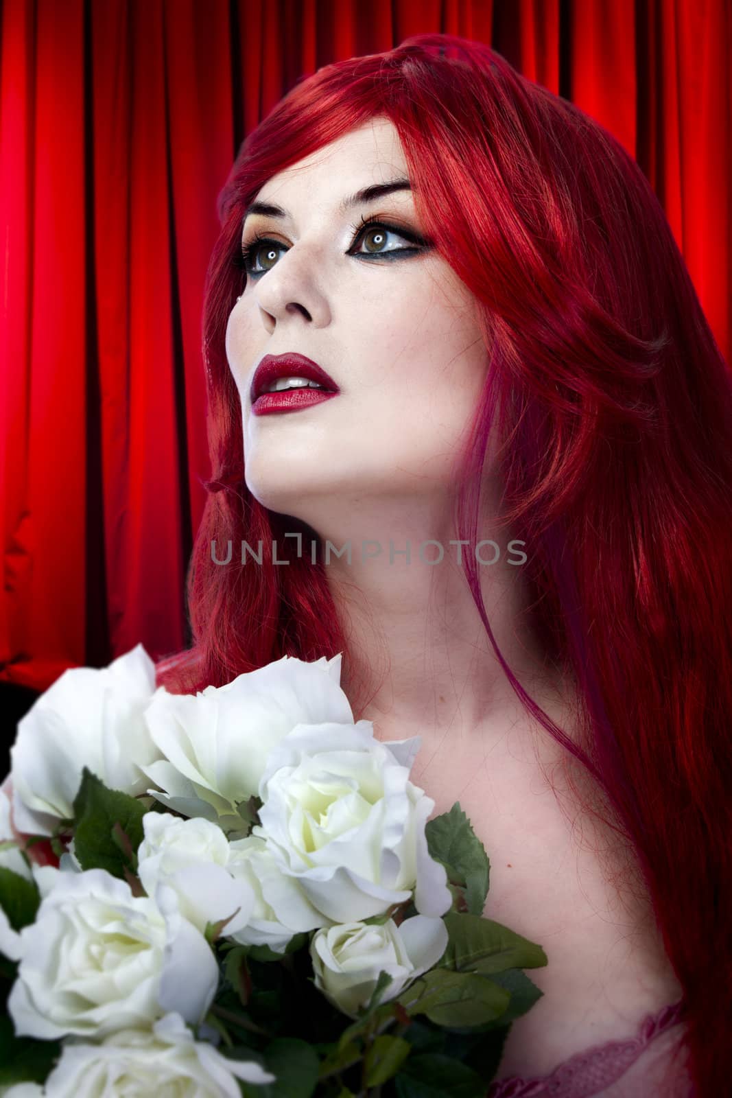 Young model with whites roses over cabaret background