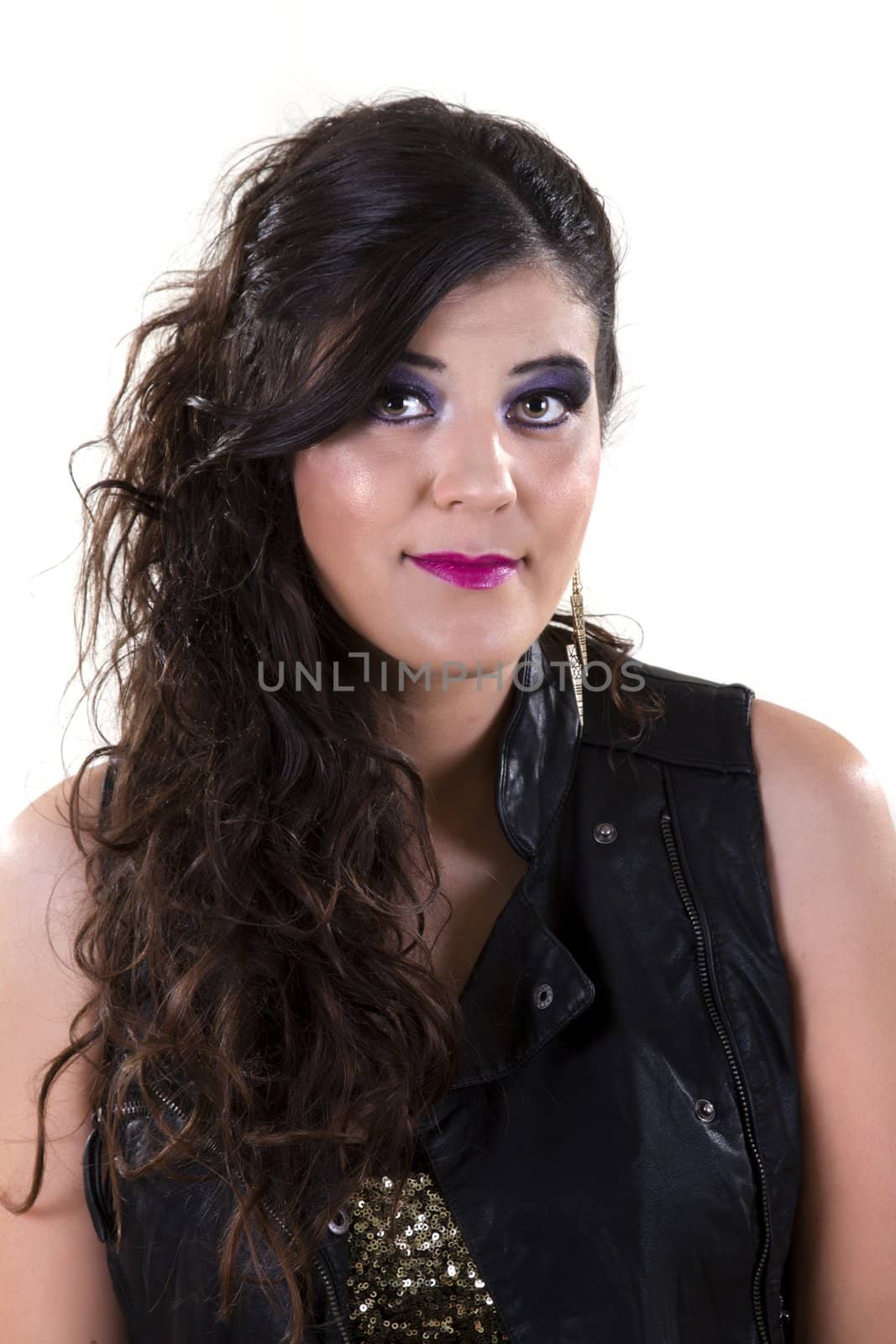 View of a beautiful girl in dark leather clothes against a white background.