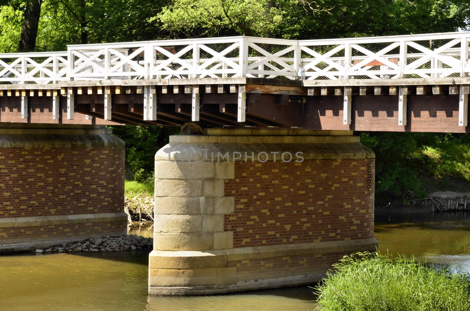 This photo present Bad Muskau - double bridge on the river Neisse.