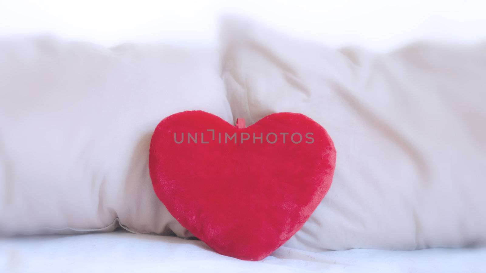 heart pillow on the bed for valentine day