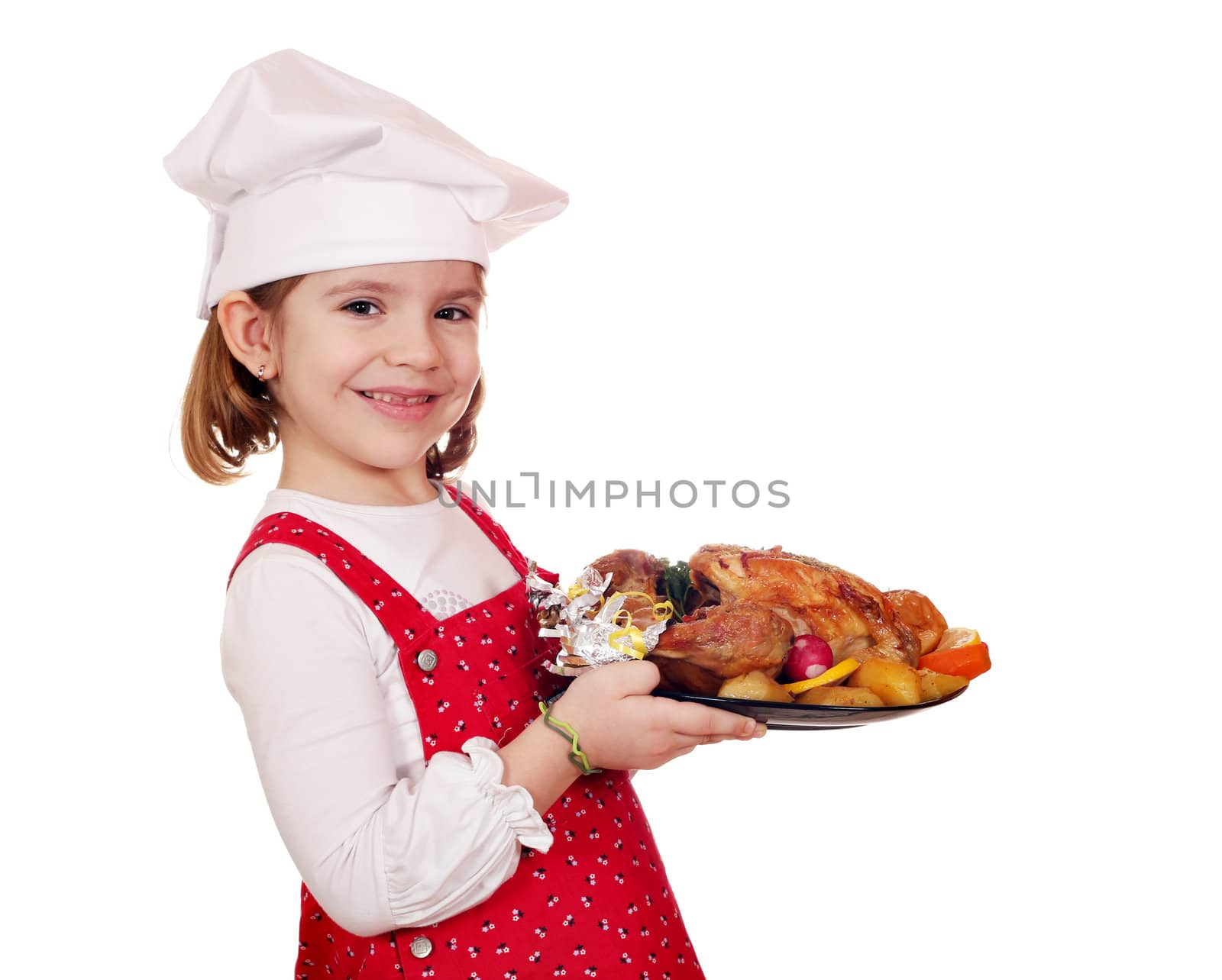 happy little girl cook hold roasted chicken