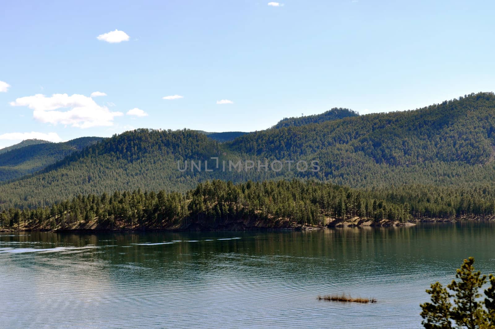 Black hills and water background