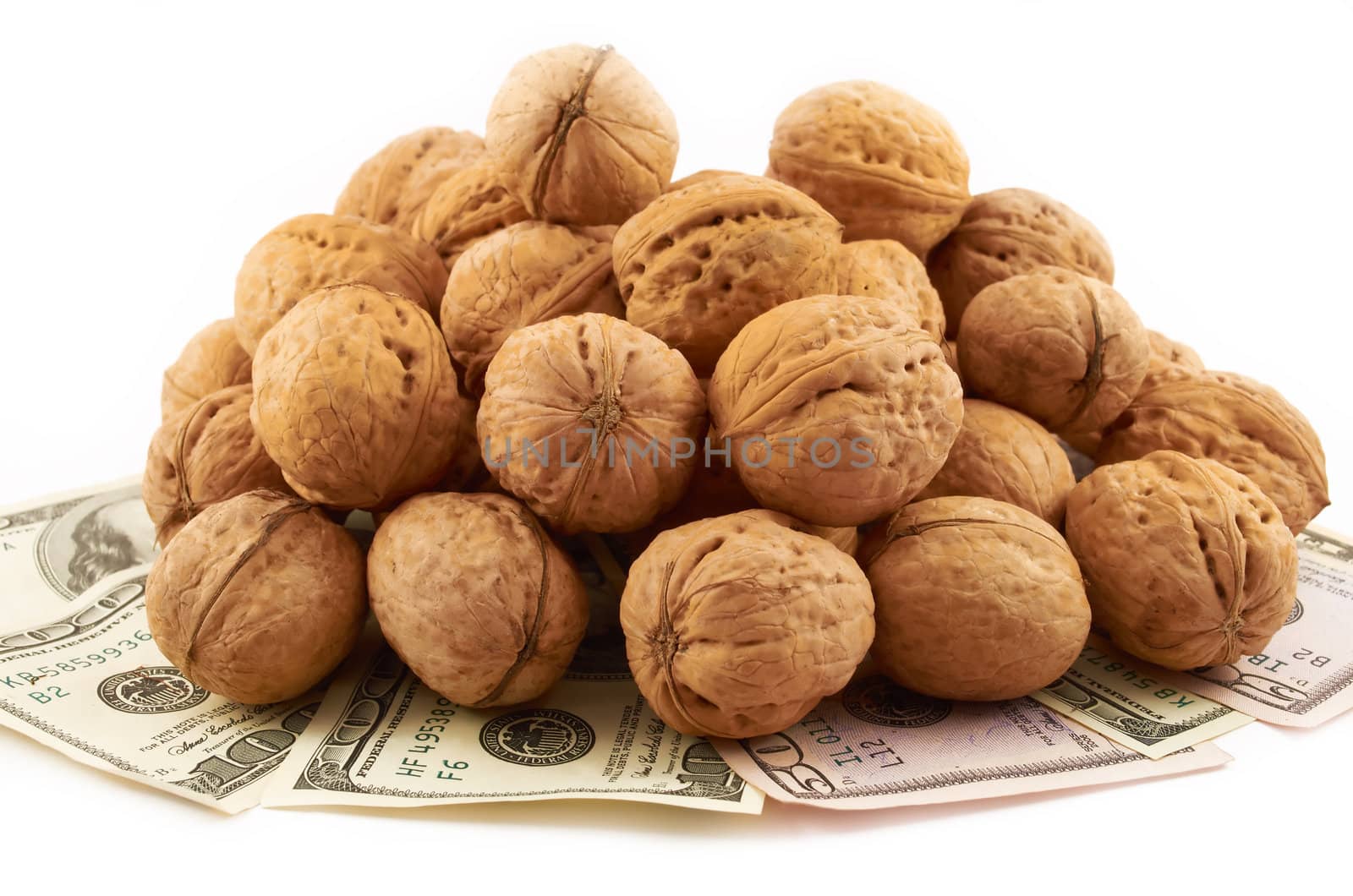 Mountain of nuts on dollars