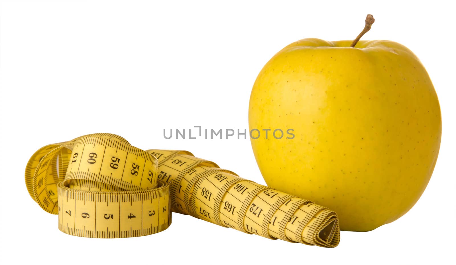 yellow apple and measuring tape on a white background