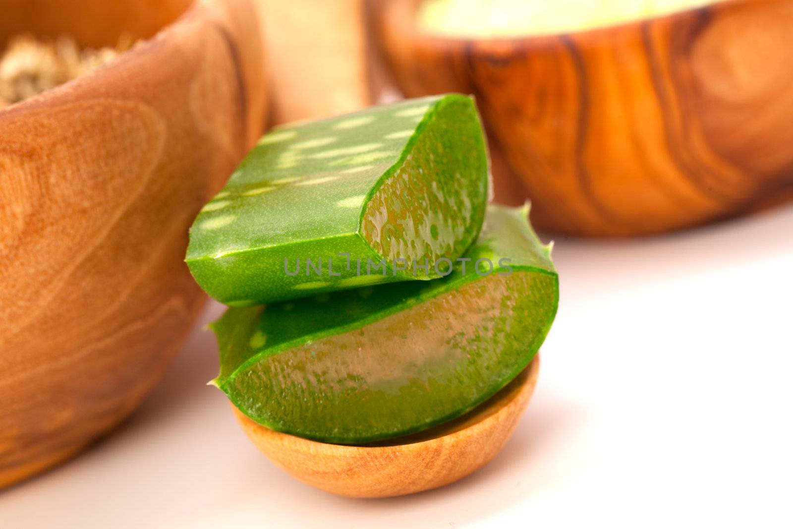 aloe vera fresh leaf on wooden spoon