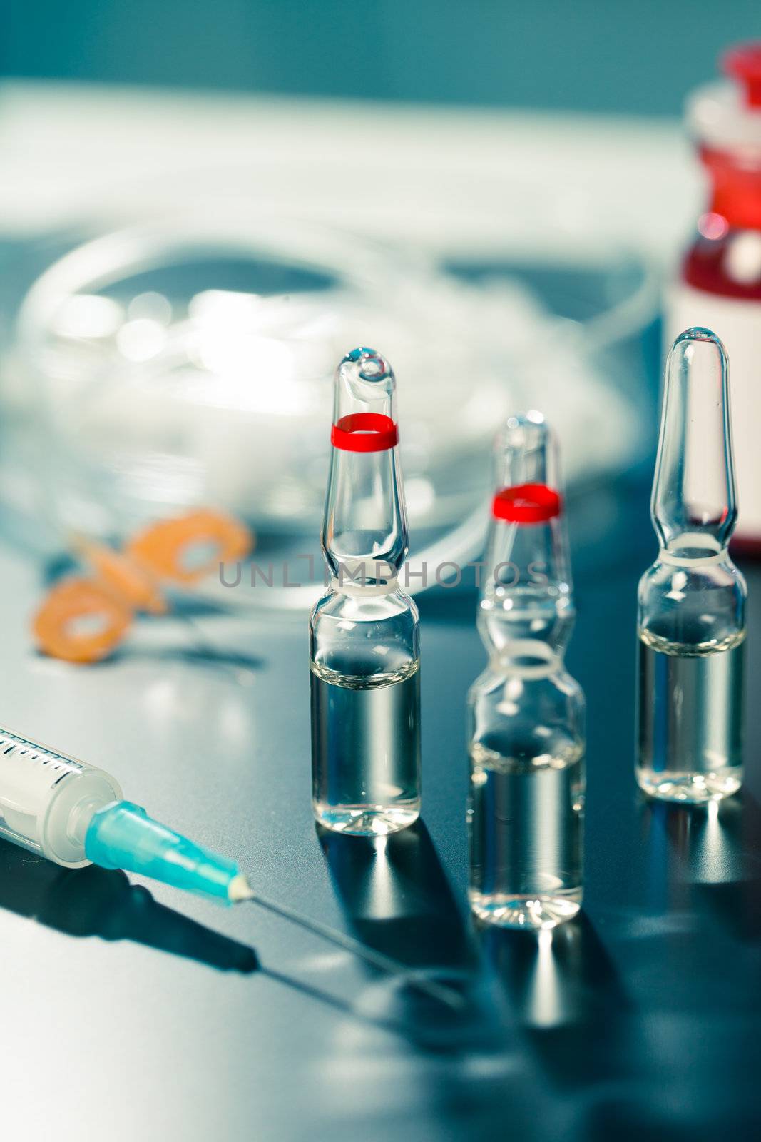 medical ampoule and syringe. Vials of medications. by motorolka