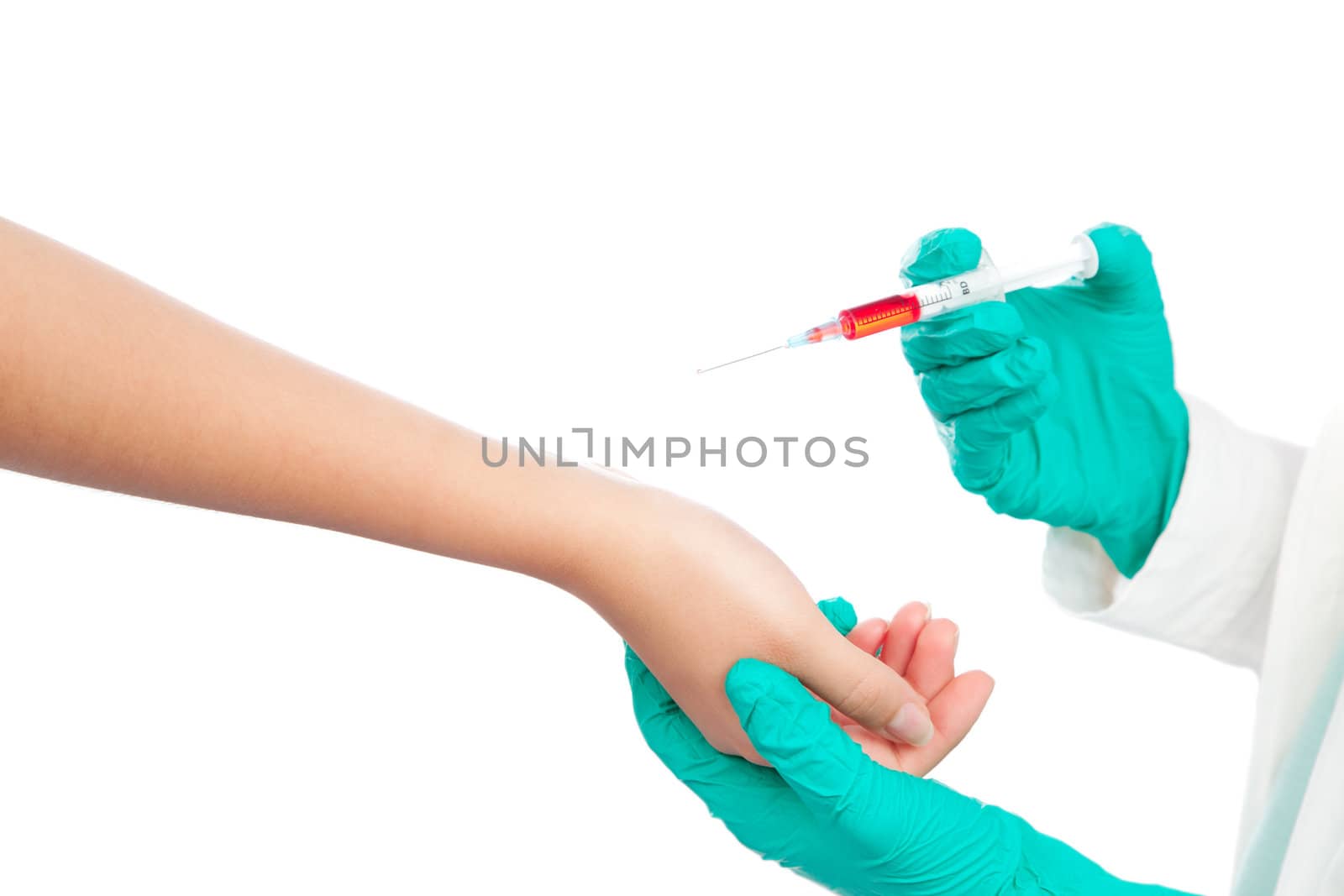 Doctor giving an injection to patient. Isolated on white background