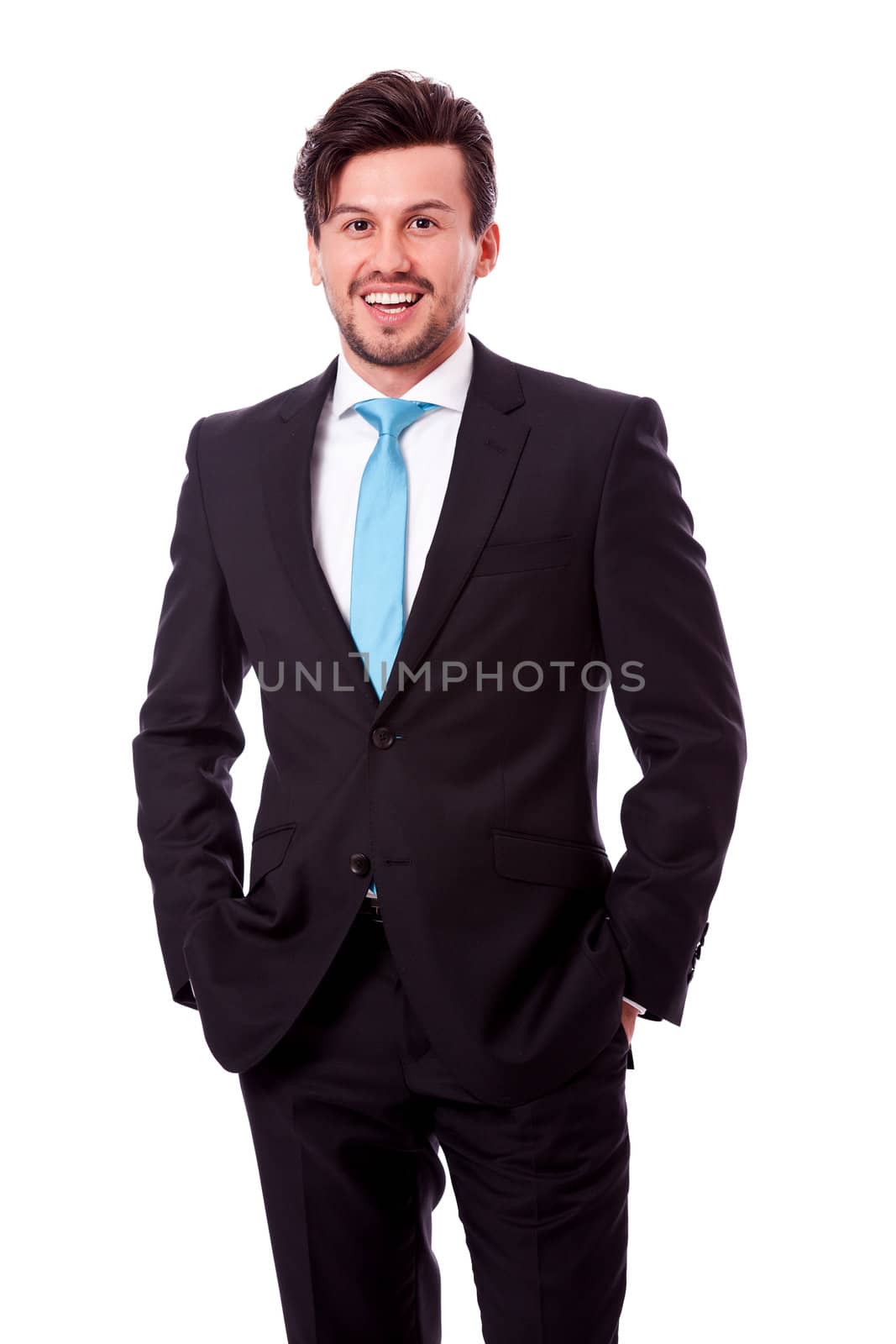 successful young business man smiling isolated on white background