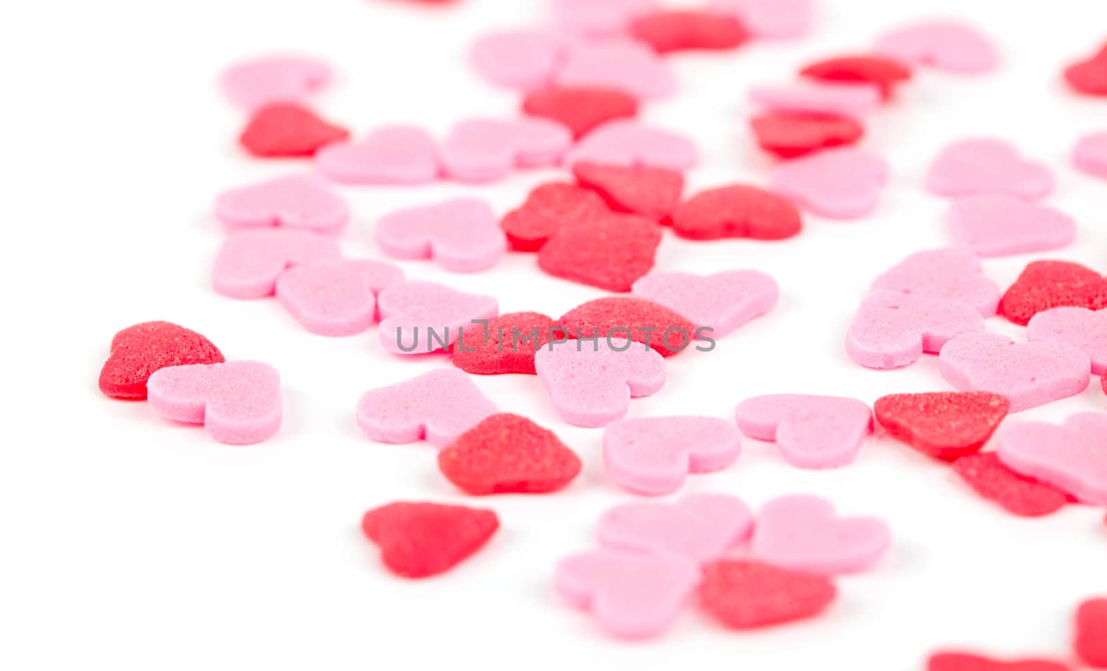 Pink andc red hearts - decorations for cakes, isolated on white background.