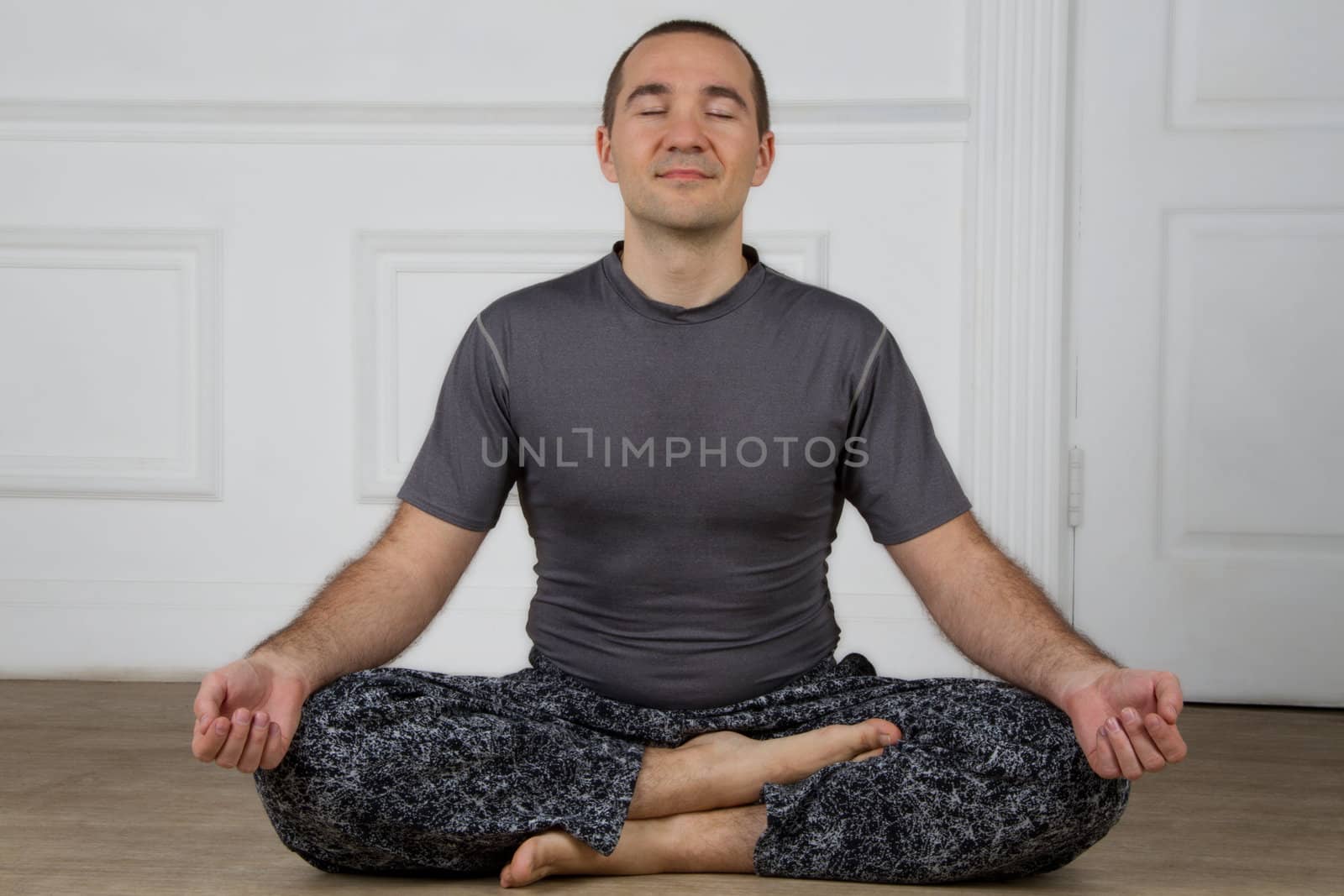 Man meditating by Marina_Po