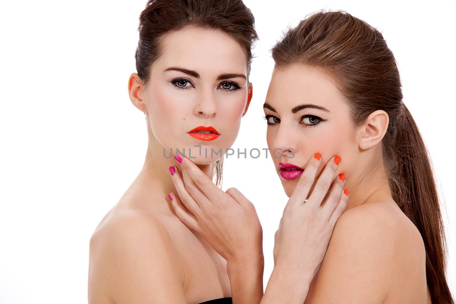 two beautiful girls with colorfull makeup isolated on white background