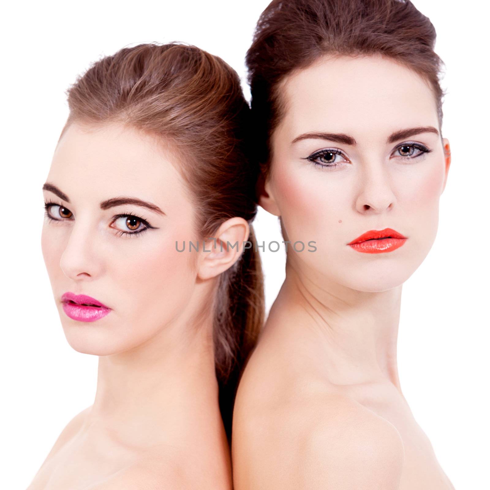 two beautiful girls with colorfull makeup isolated on white background