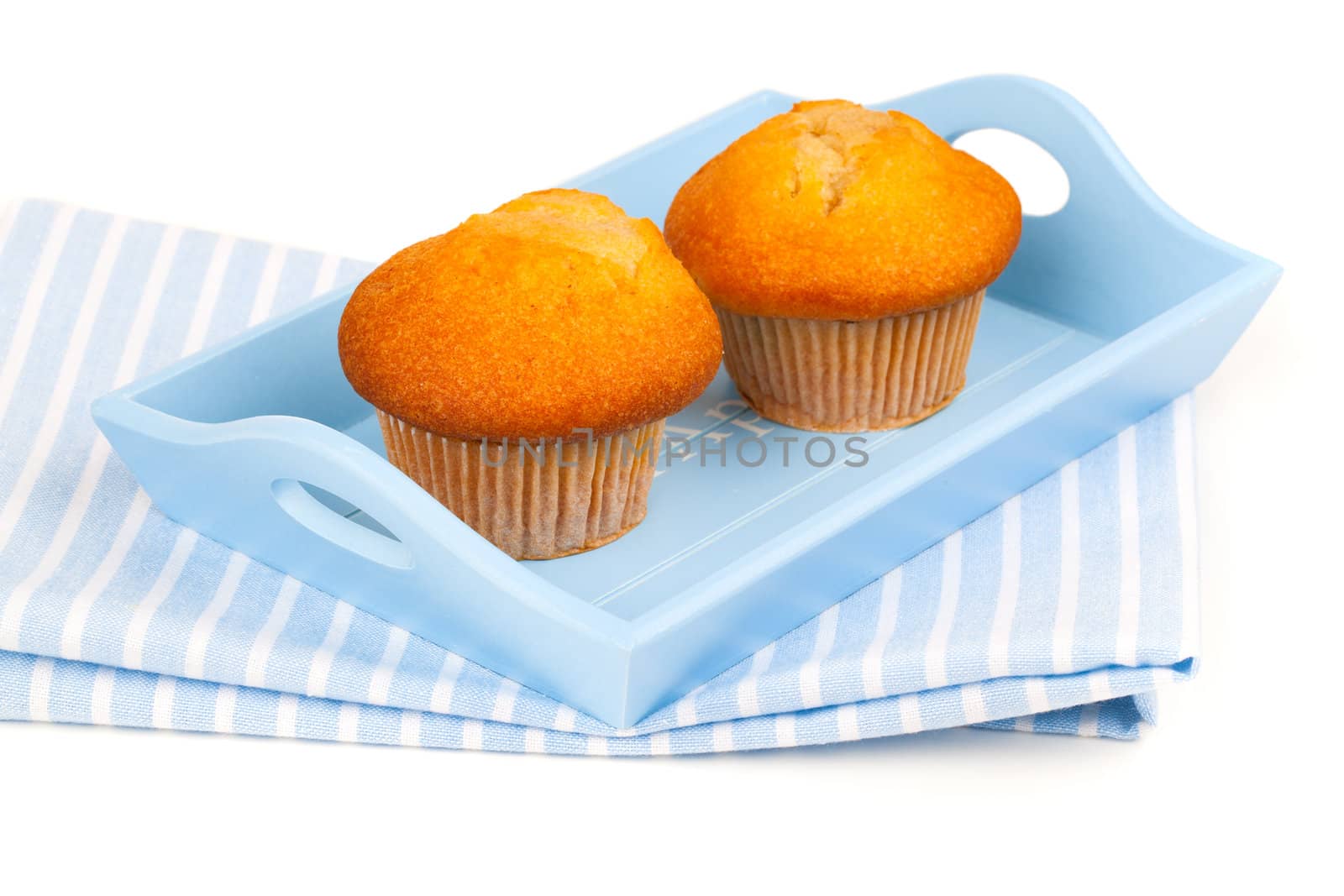 muffins in a tray for breakfast. isolated on white background.