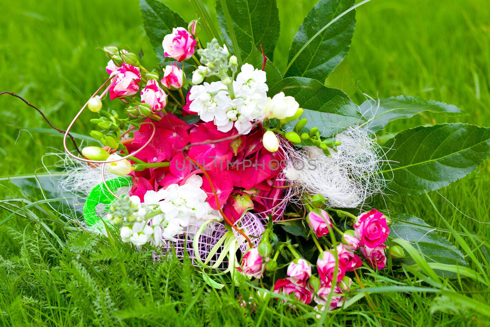 bouquet of flowers on green grass