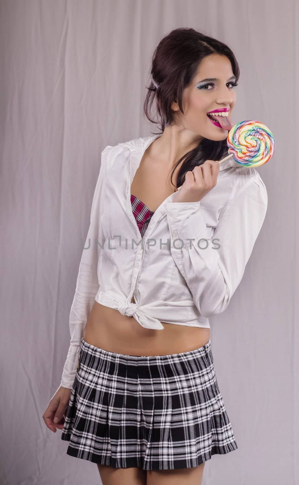 beautiful girl with a lollipop by membio