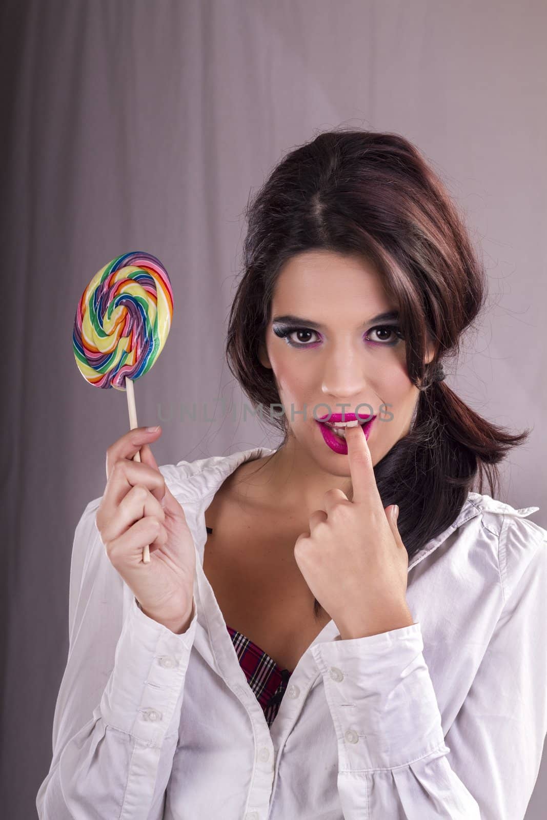 beautiful girl with a lollipop by membio