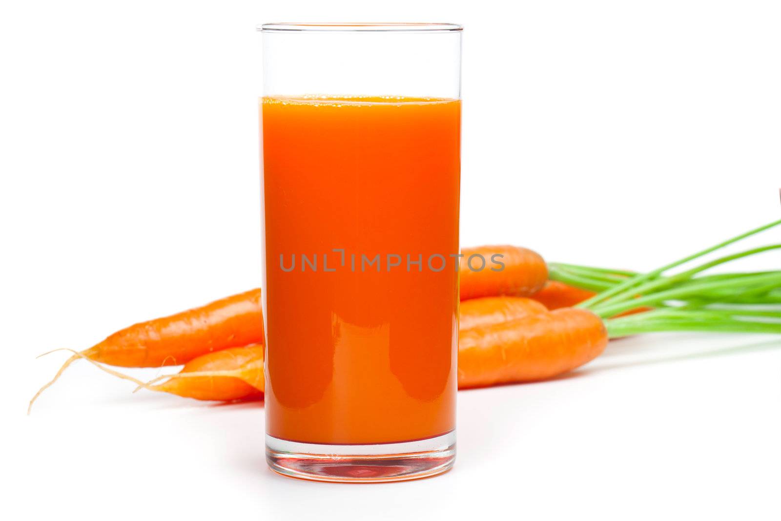 Carrot juice and fresh carrot, isolated on white background