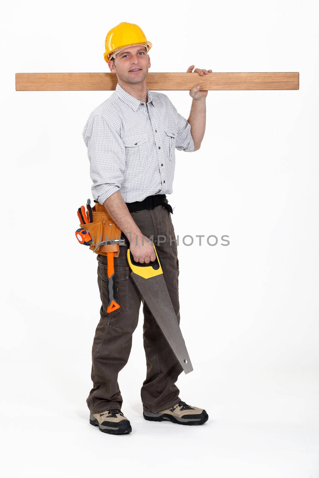 Man carrying plank of wood by phovoir