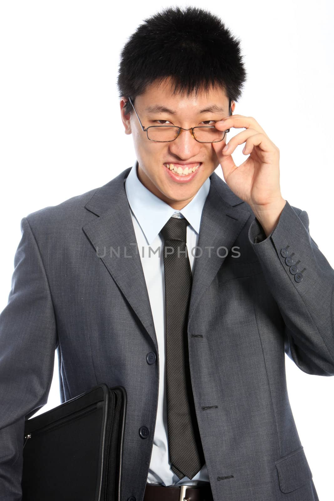 Smiling asian man in suit wearing glasses - isolated on white