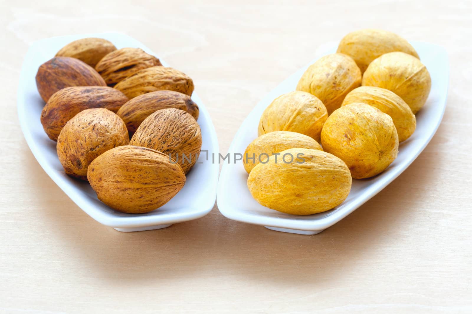 two plates with large nuts