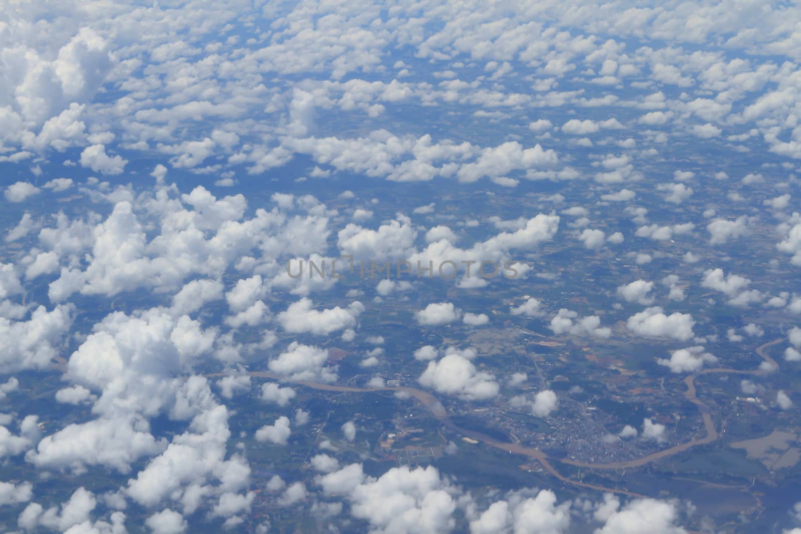 Aerial view of peaceful earth covered in clouds