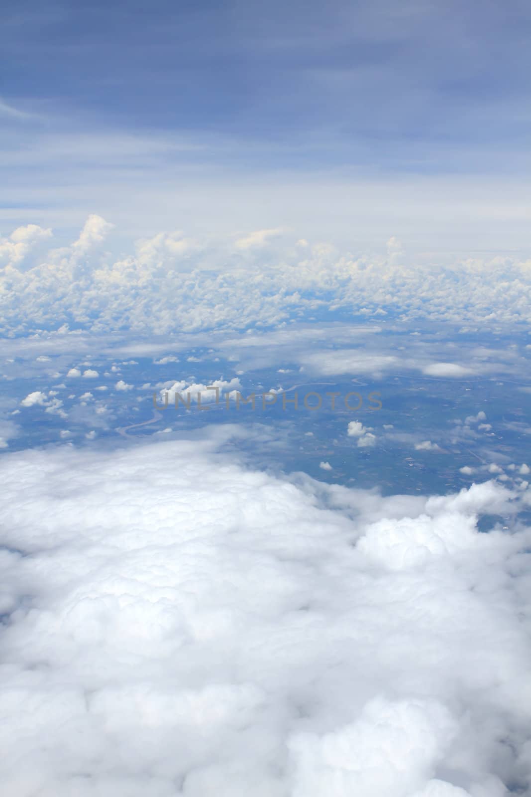 Aerial view of peaceful earth covered in clouds