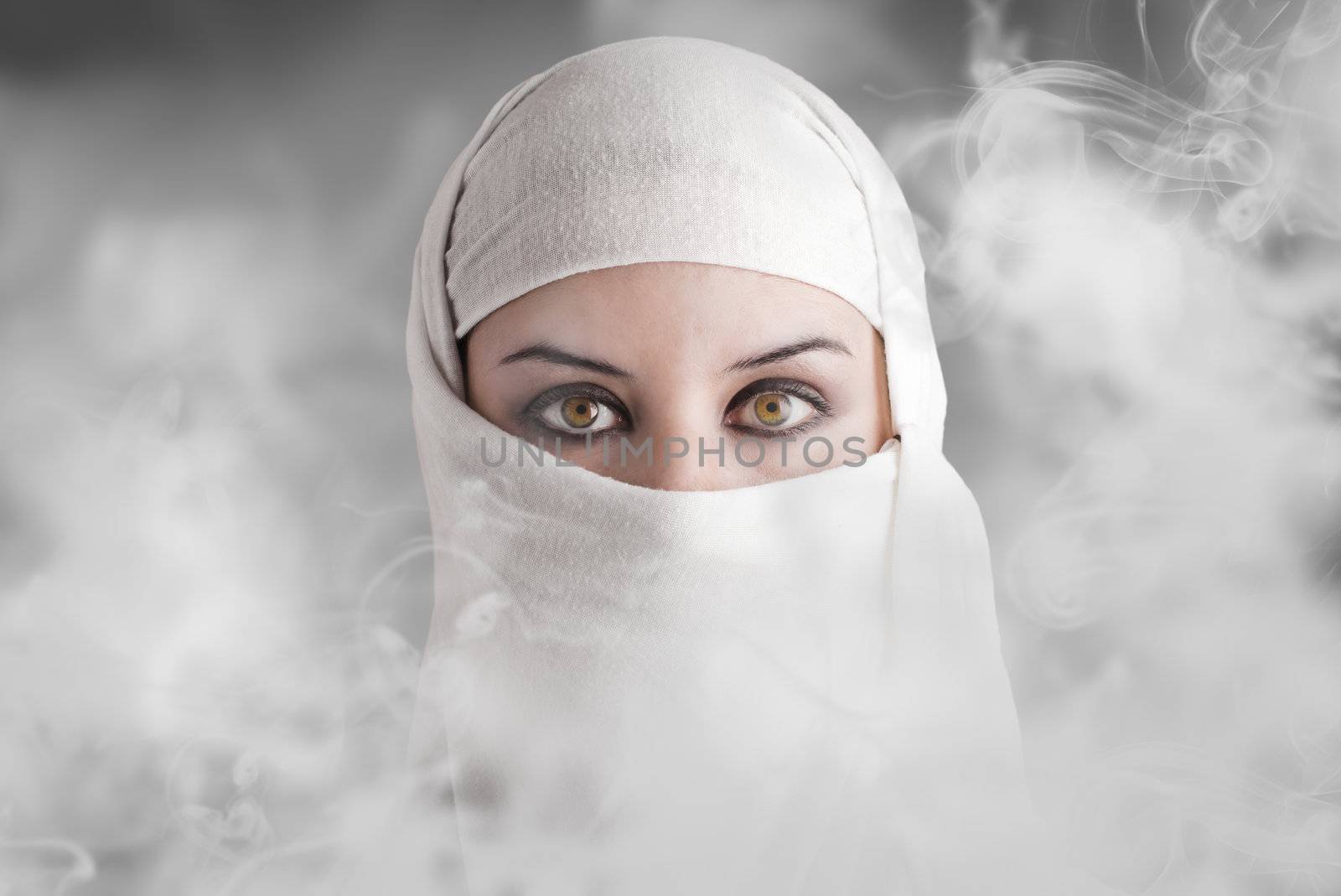 Arabic woman into smoke clouds