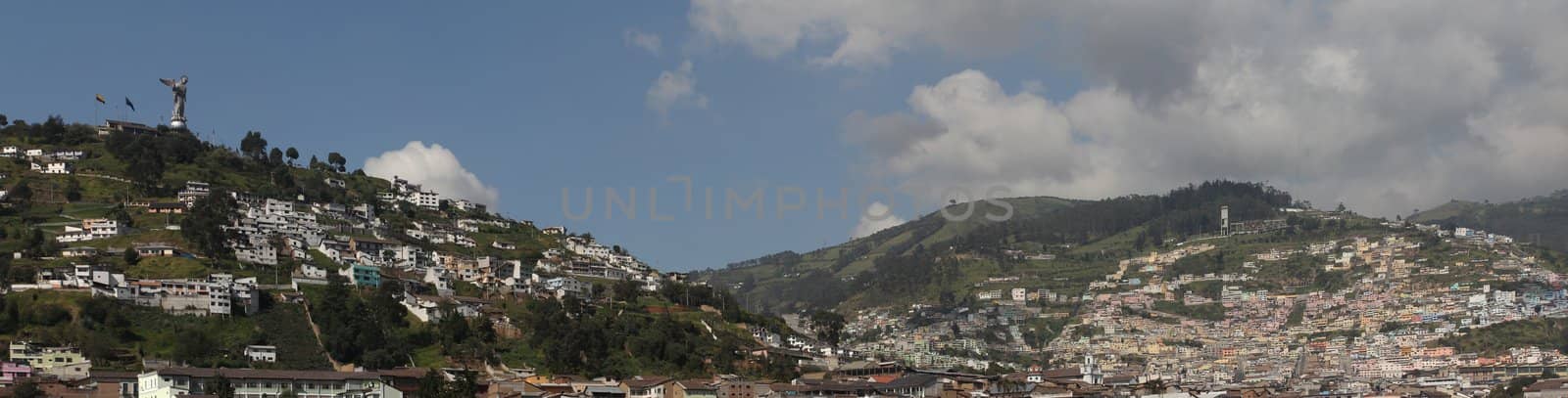 El Panecillo and panoramic view of Quito, Ecuador. This photo is made attaching together various photos
