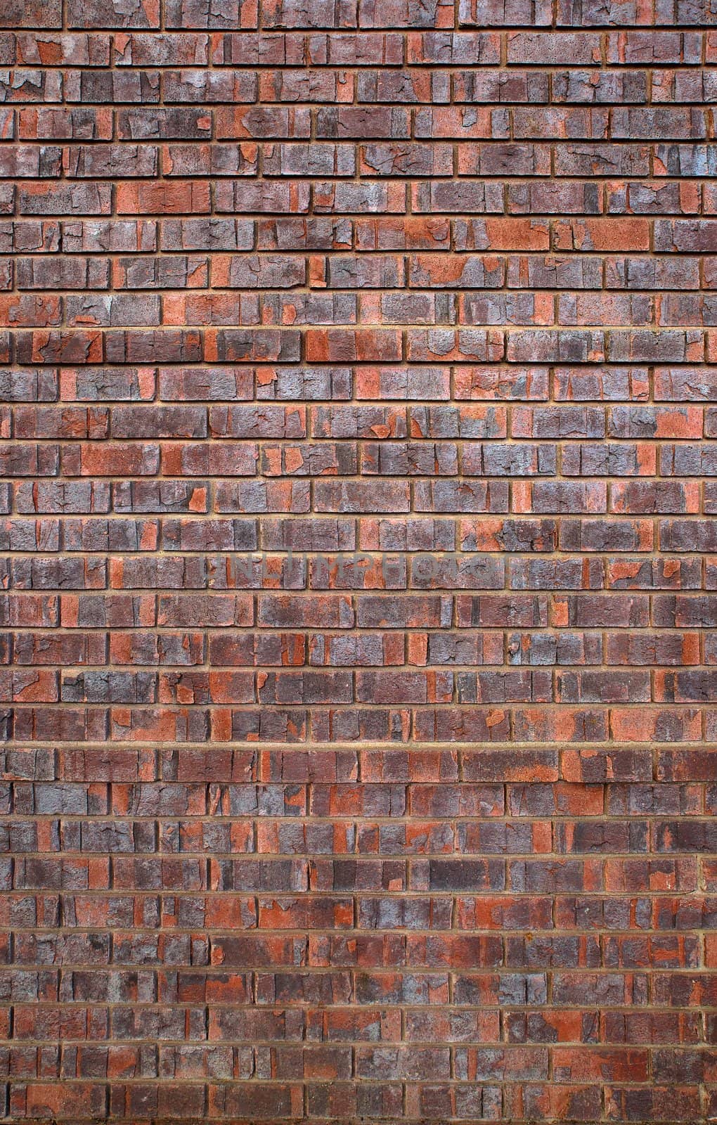 Manufactured red Faux used brick wall
