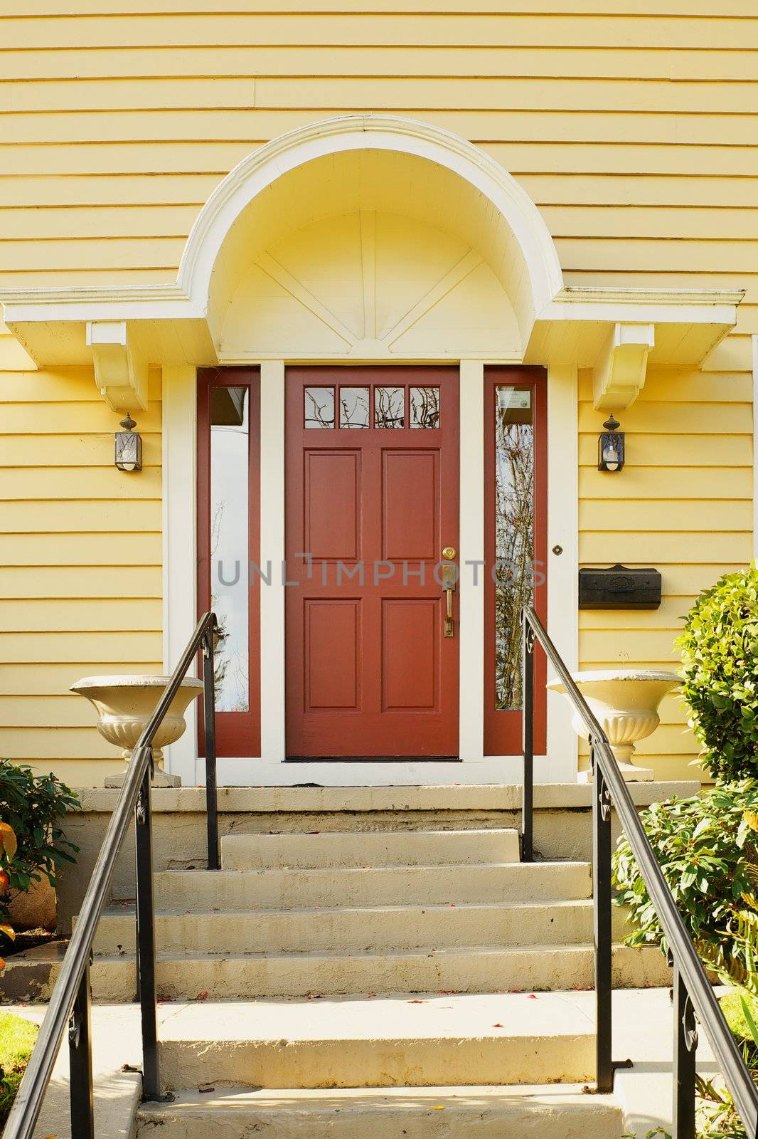 Magenta Home door bordered windows and a yellow painted home