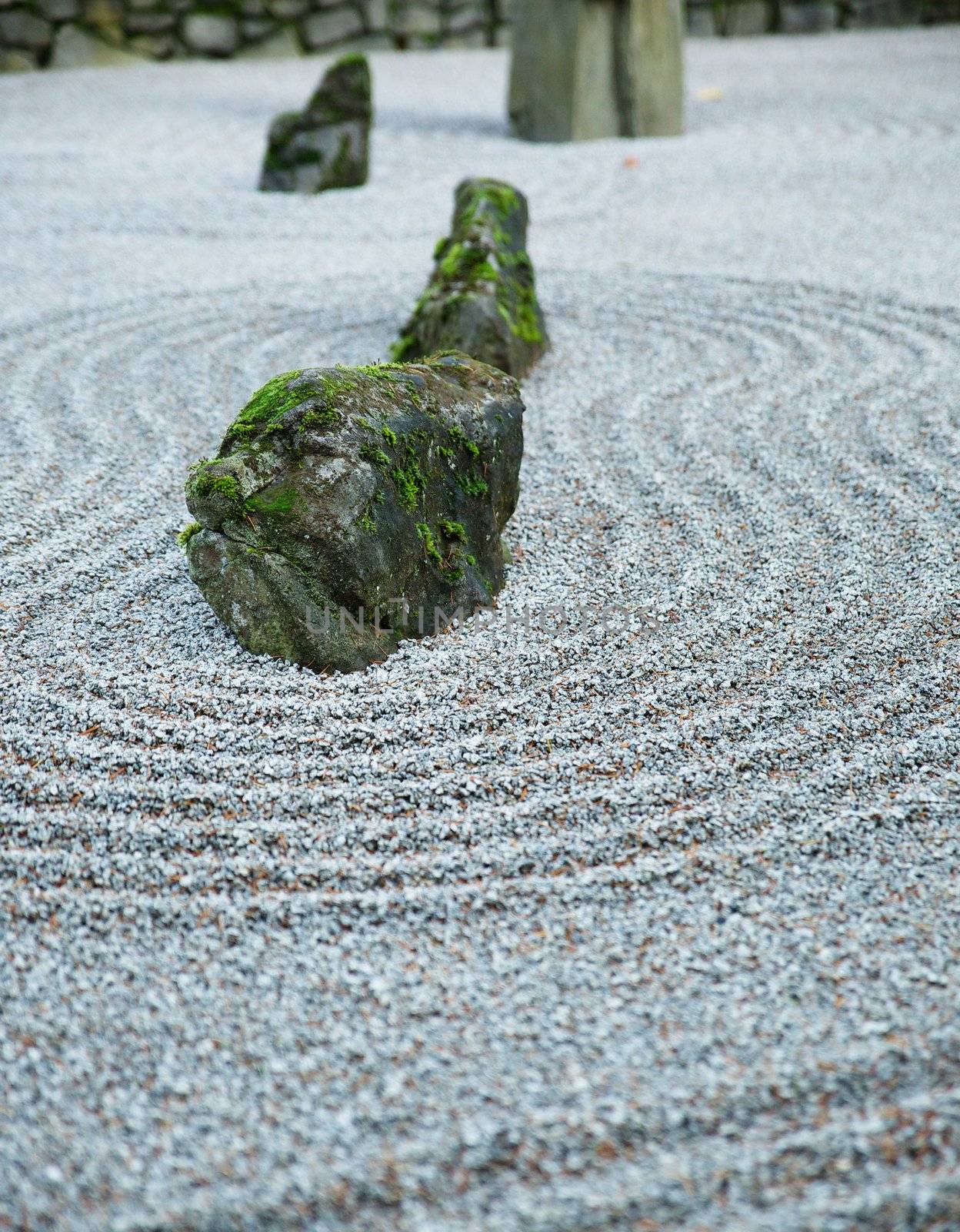 Zen Garden on Dark day with moss covered rocks