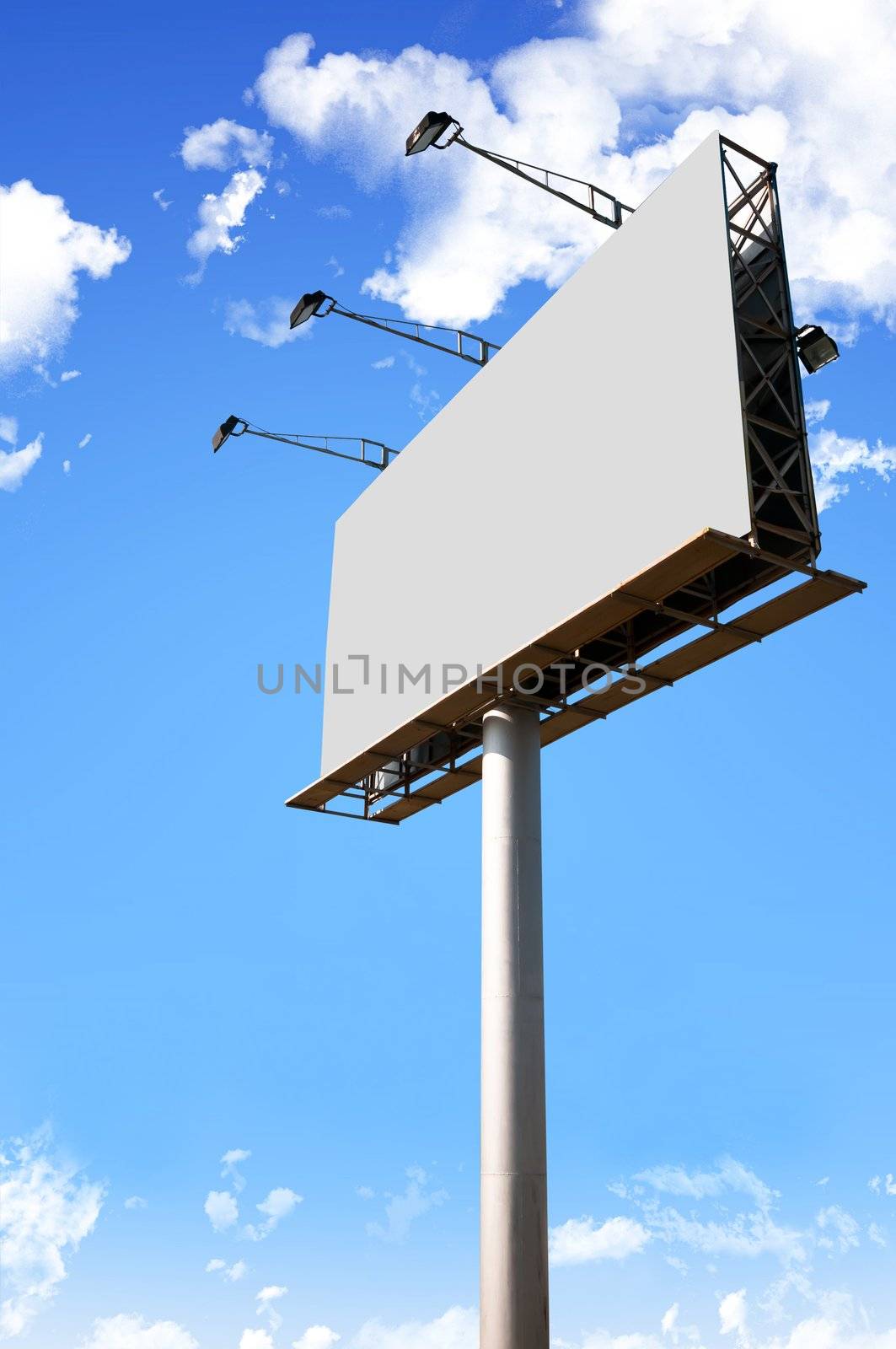 blank billboard on blue sky by ponsulak