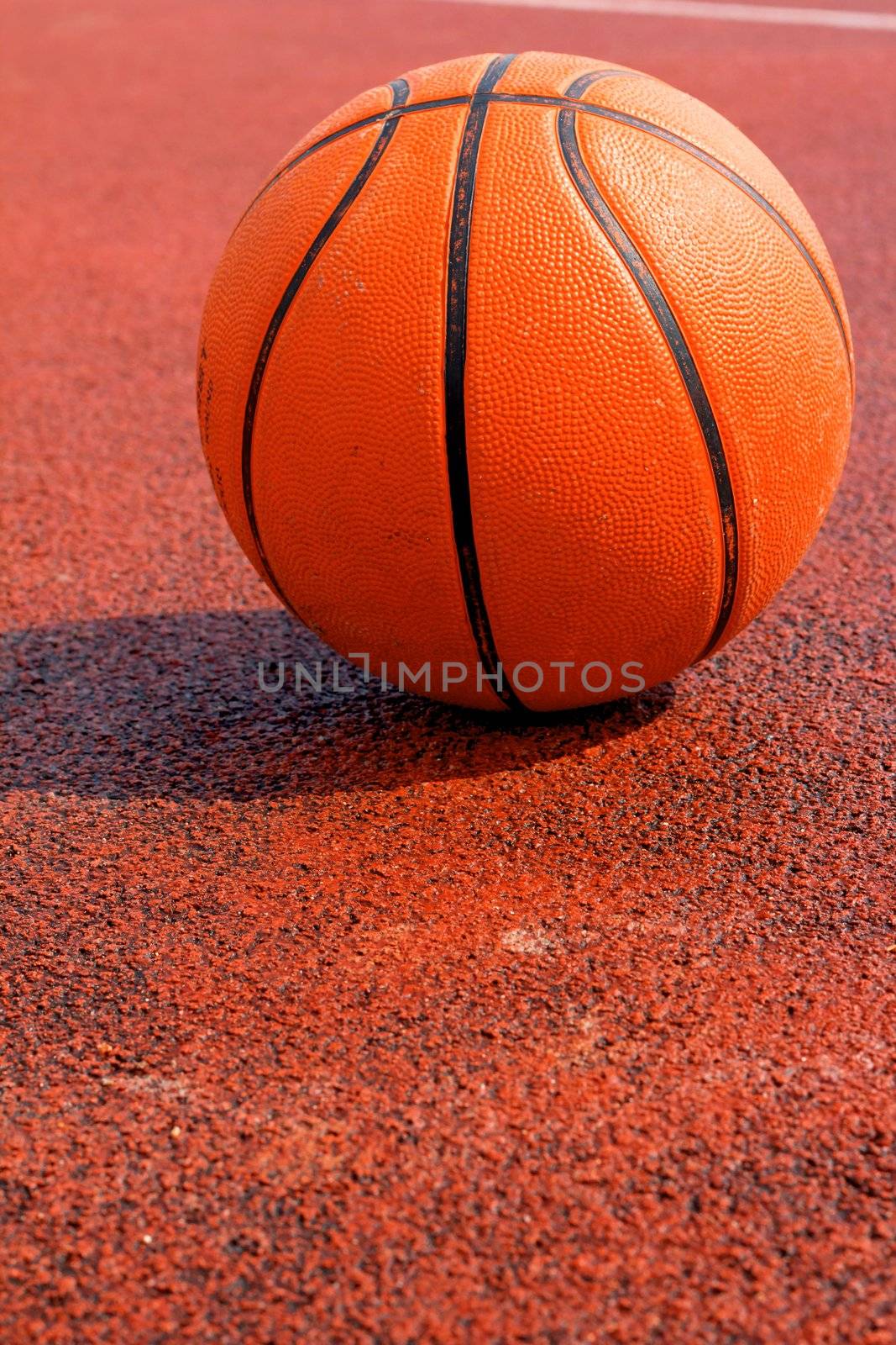 basketball on court outdoor by ponsulak