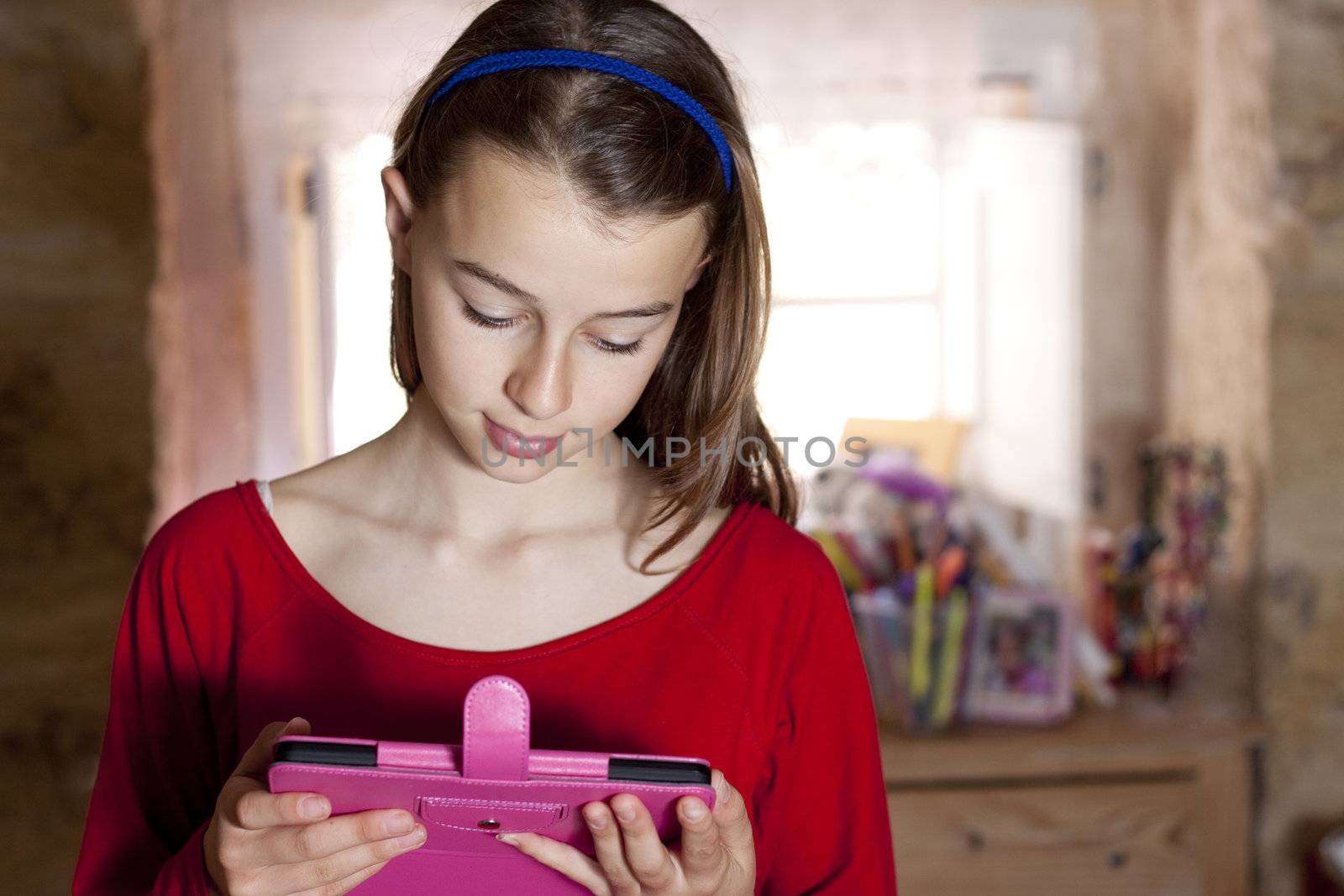 Teenager reading from her ebook