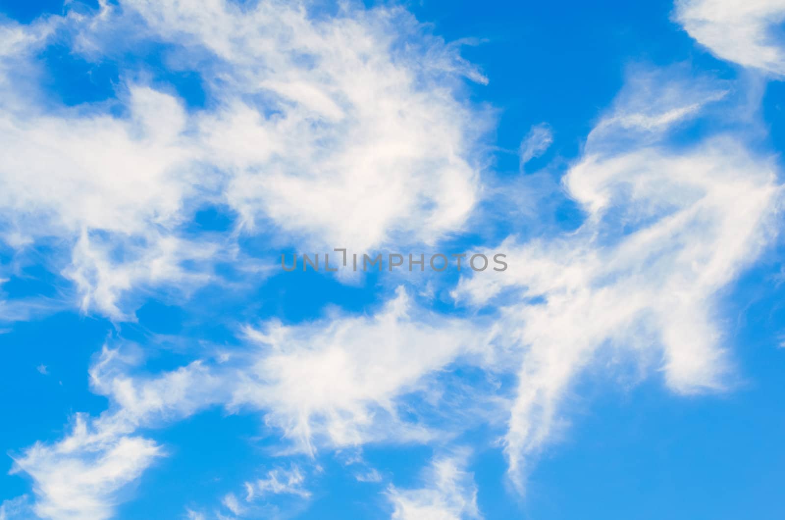 Blue sky with clouds in the late summer