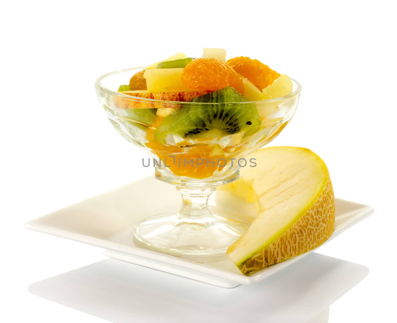 fresh fruit cocktail with apple kiwi in glass