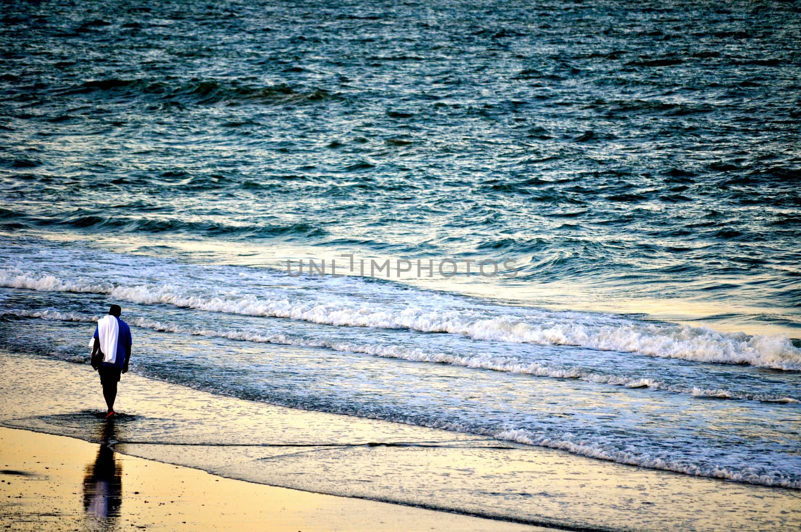 Man walking on the beach