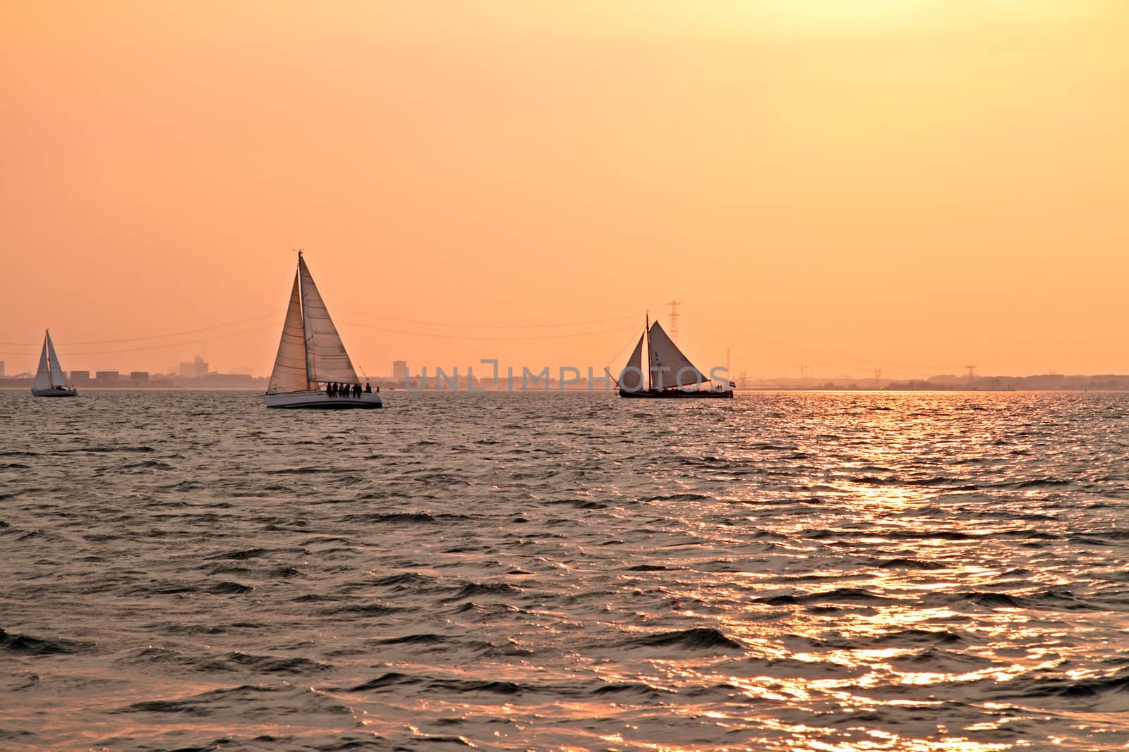 Sailing at sunset on the IJsselmeer in the Netherlands