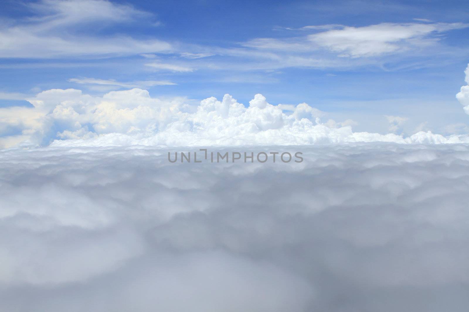 Airplane above clouds by rufous