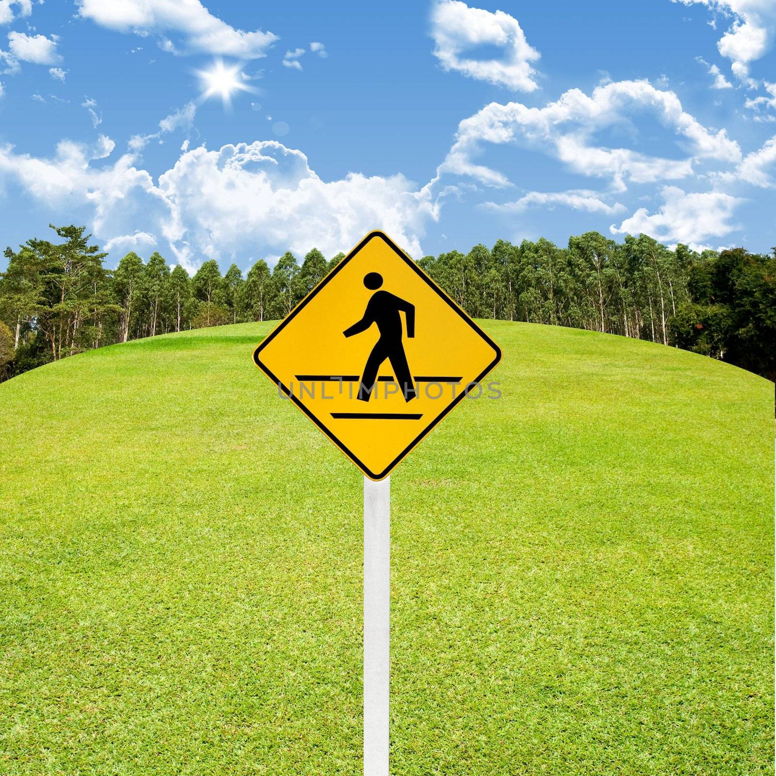 Crossroad sign with green golf course background