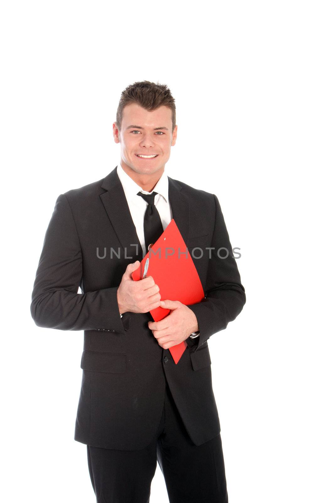 Handsome young man wearing a business suit and holding a red file