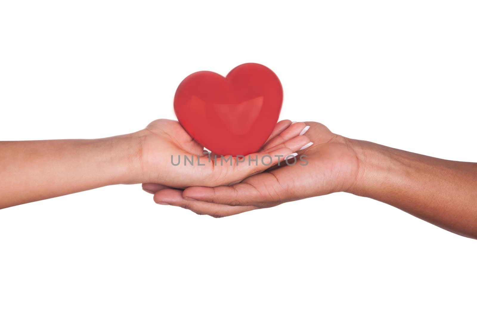 african Man and woman holding red heart in hands isolated on white