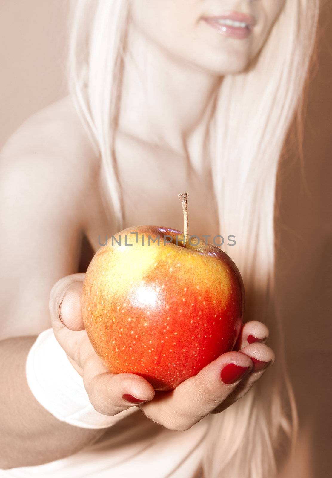 hand that suggests to take apple by ssuaphoto