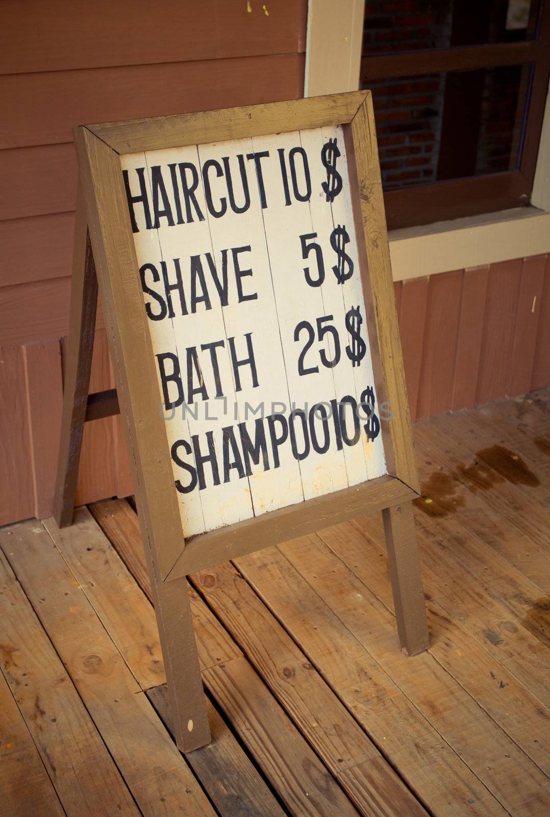 old haircut wooden billboard on wood background