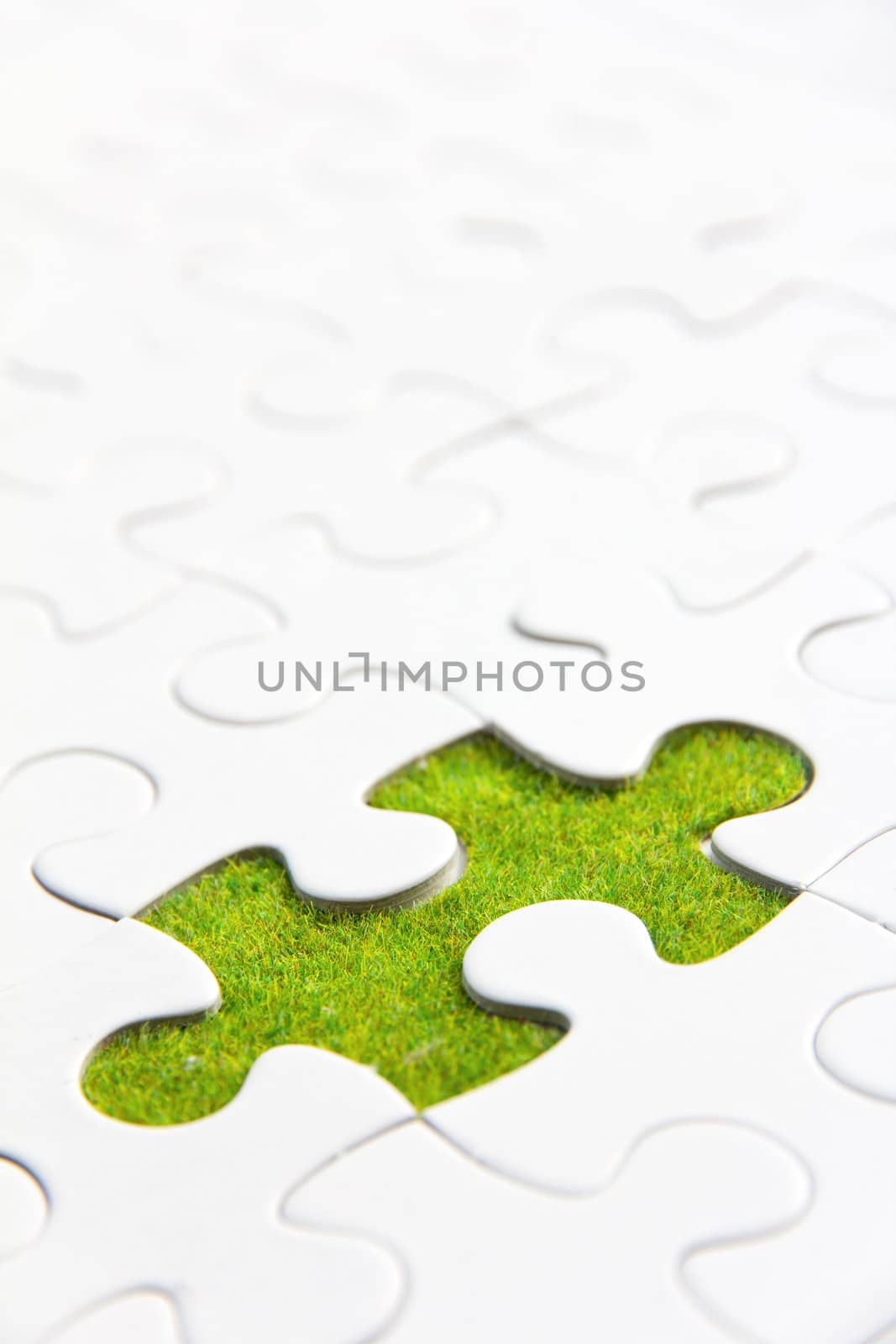 missing puzzle piece, green space concept by ponsulak