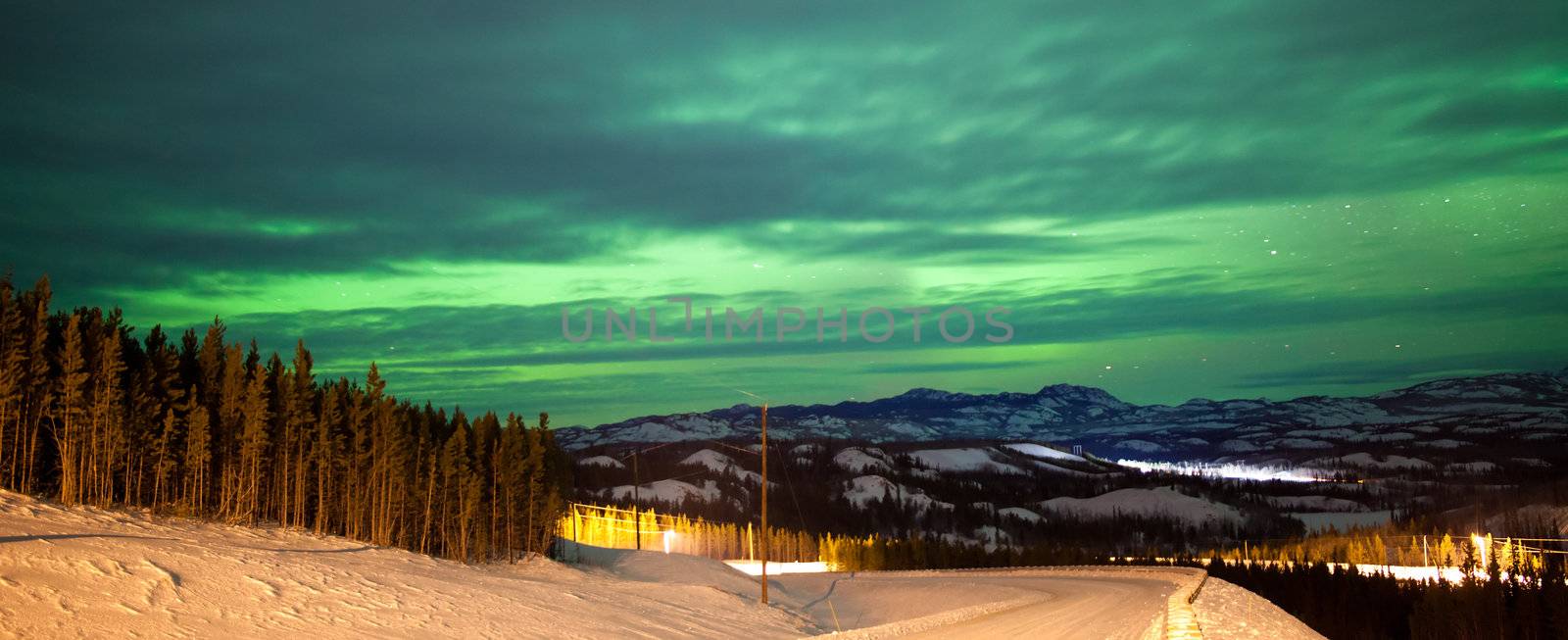 Northern Lights Aurora borealis over rural winter by PiLens