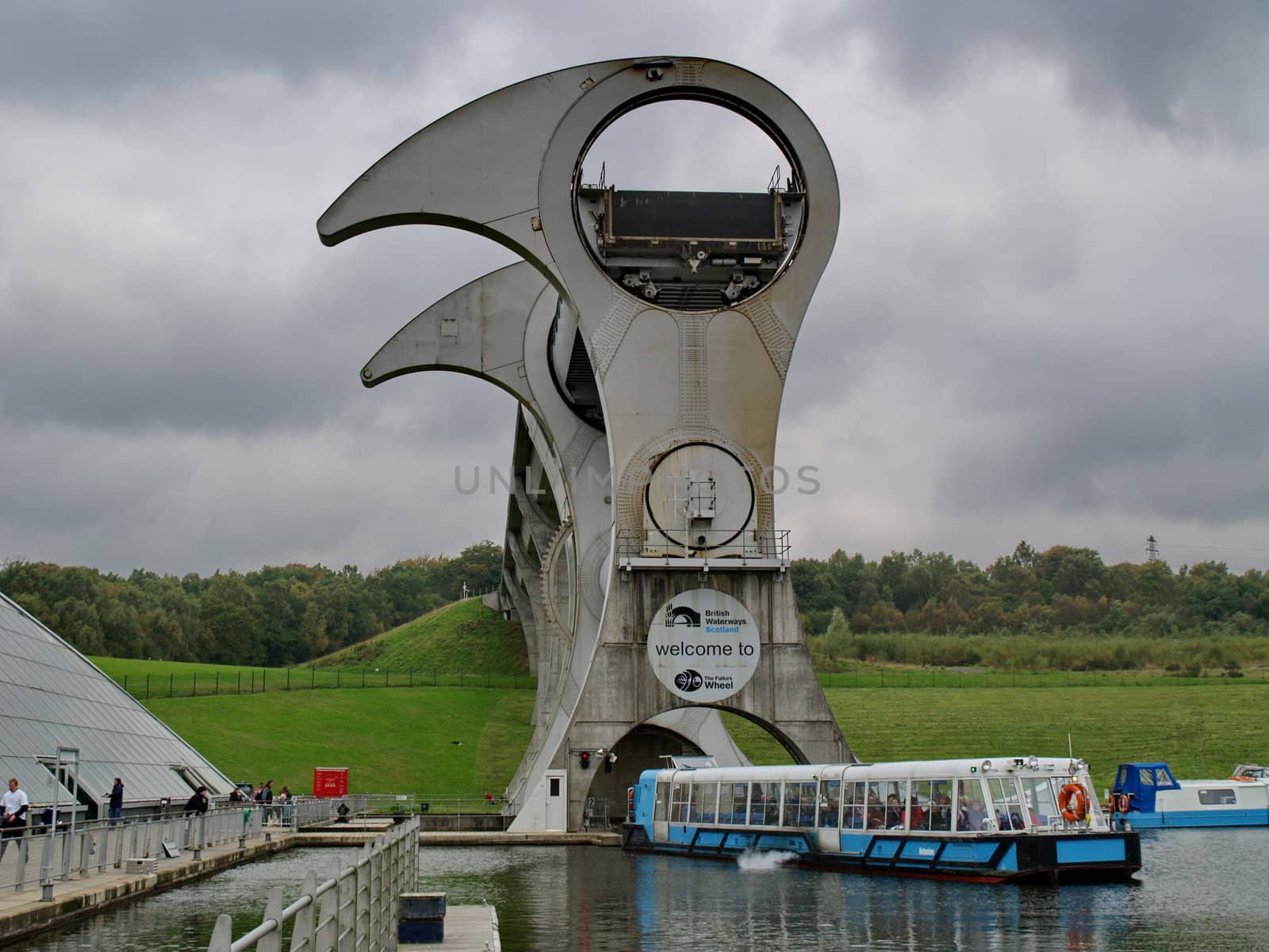 FALKIRK - OCTOBER 18:View of the Falkirk Wheel on October 18, 2010 in Falkirk, Scotland. The Falkirk Wheel is a rotating boat lift located in Scotland, UK, connecting the Forth and Clyde Canal with the Union Canal, opened in 2002.