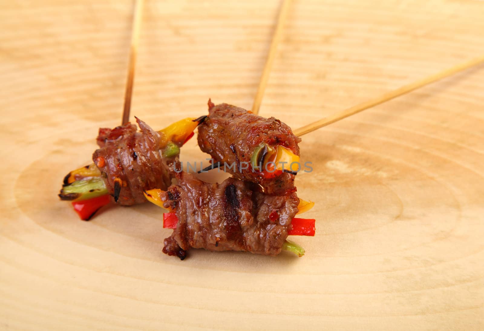 Rolle meat appetizer on wood plate