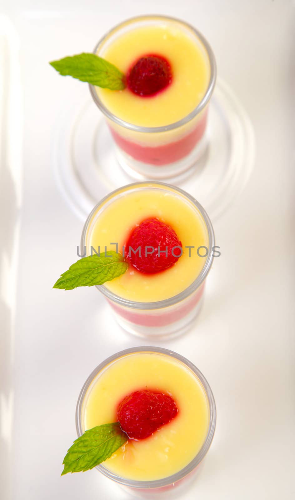 Ice cream in glasses with mint and strawberry top view