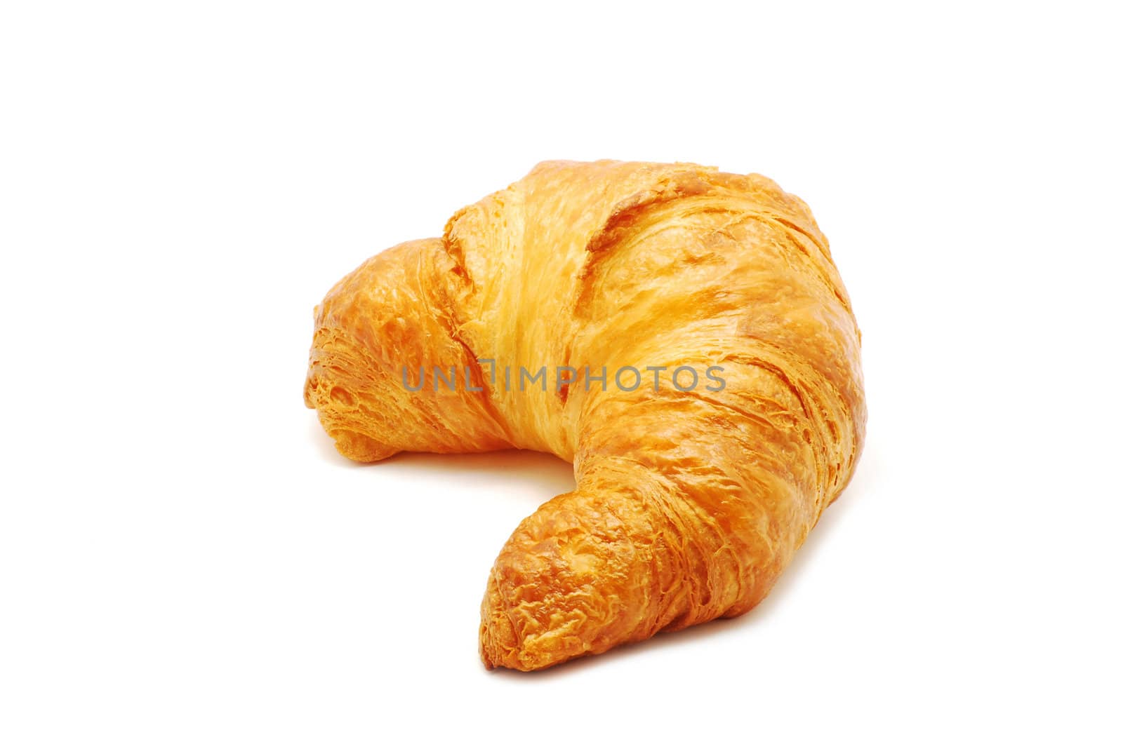 Fresh and tasty croissant over white background